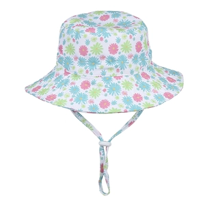 Close-up of floral baby sun hat with adjustable drawstring and toggle in high detail