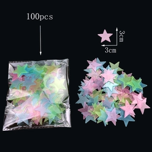 Detailed view of 100pcs 3cm glow in the dark stars set for wall decoration