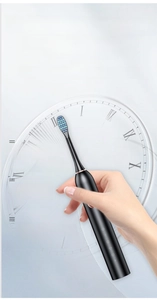 Detail of a matte black electric toothbrush with 180-day long battery life display