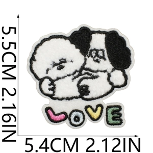 Detail view of dog embroidery patch showing 5.5cm x 5.4cm size dimensions on white background