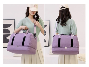 Detailed view of purple large-capacity travel bag with bottom wet dry separation pocket