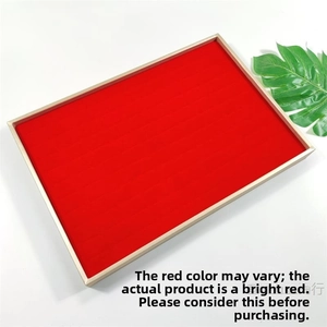 Detail view of large capacity red velvet ring display tray with 100 slots and gold trim