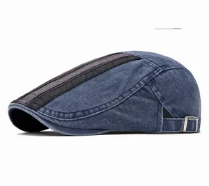 Detail of navy washed cotton flat cap featuring striped pattern and adjustable side buckle