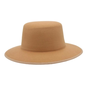 Detail of camel wool boater hat featuring high flat top and precision woven edge piping
