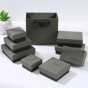 Dark green premium jewelry gift box set with matching paper shopping bag detail view