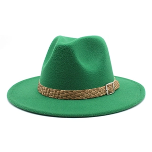 Detail of bright green wool fedora hat featuring a brown braided band and silver buckle