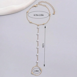 Dimensioni dettagliate del bracciale ad anello dorato con perle e misure della taglia