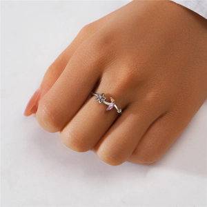 Detailed close-up of S925 silver ring featuring floral vine design and colorful gemstones