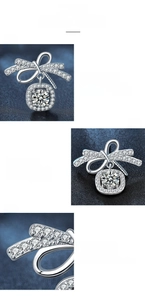 Detail of 925 silver bow stud earring with moissanite in four-prong setting