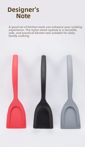 Three-piece nylon kitchen spatulas in red, black, and grey for flipping steaks and eggs
