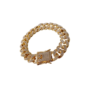 Luxurious gold-plated Cuban link bracelet with sparkling white rhinestones for a hip hop look