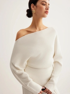 Off-shoulder cream knit long sleeve top with irregular neckline and slim waist fit