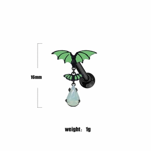 Detail of bat-shaped navel ring with black plating and green opal pendant