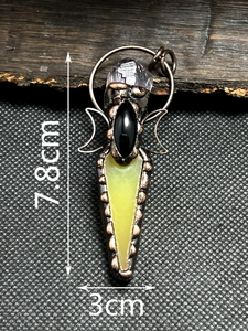 Detail of vintage gothic pendant with purple crystal and black agate, 7.8cm height