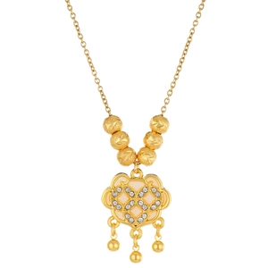 Detailed macro view of gold-plated lock pendant with pavé crystals and triple bead tassels
