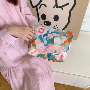 Floral cotton canvas makeup bag with artistic oil painting pattern and zipper closure