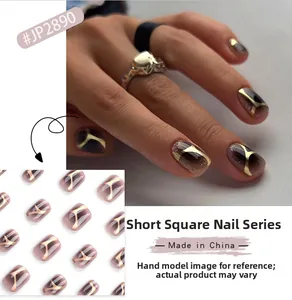 Short square press-on nails with deep purple cat-eye glitter and gold geometric lines