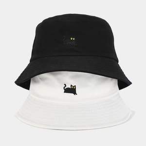 Chic cotton bucket hats in black and white featuring cute black cat embroidery