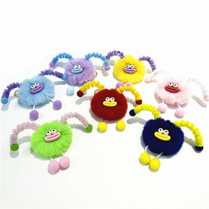 Set of colorful plush monster keychains in seven vibrant colors for bags and backpacks