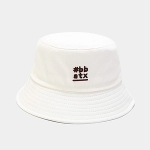 Close-up of brown #bb atx embroidery on white cotton canvas bucket hat with stitching