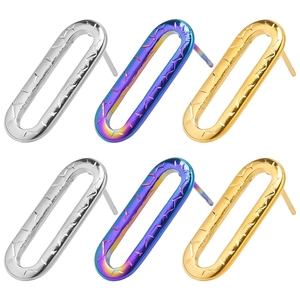 Detailed view of geometric textured oval stud earrings in silver gold and rainbow tones