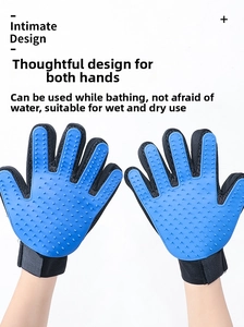 Detail of blue silicone bristles and mesh fabric on a pet grooming and massage glove