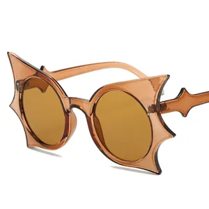 Trendy bat-wing shaped sunglasses in amber brown finish with translucent resin frame