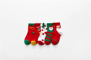 Detail of 5 pairs of cotton Christmas socks for kids with Santa and reindeer patterns