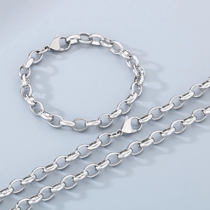 Sleek stainless steel oval link chain necklace and bracelet set with lobster clasps