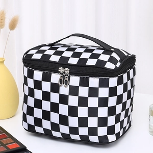 Large waterproof checkerboard travel toiletry bag with black handle and dual zippers
