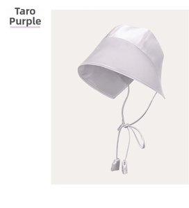 Detailed view of the taro purple silk texture and long strap design on the sun hat