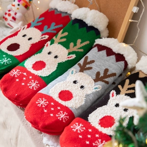 Thick Christmas reindeer floor socks with plush fleece lining and snowflake patterns
