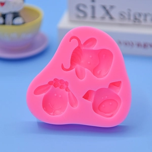 Pink silicone mold with cow, sheep and pig animal shapes for cake and chocolate DIY