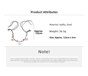 Detail of bohemian raffia woven necklace with natural shells, 122cm length and 36.5g weight