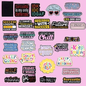 Collection of creative enamel pins with English slogans on a pink background