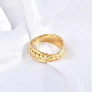 18K gold plated stainless steel hollow chain ring on elegant white satin background