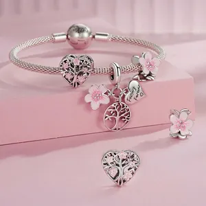 925 sterling silver charm bracelet with pink enamel cherry blossoms and tree of life charms