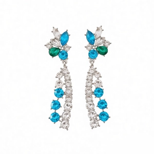 Vintage floral crystal drop earrings with sparkling blue and green stones on white background