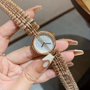 Rose gold vintage bracelet watch for women featuring a minimalist round quartz dial