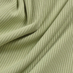Detail shot of the sage green ribbed knit fabric showing the soft texture and elasticity