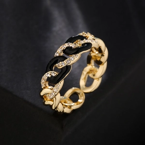 Gold chain link ring with black enamel accents and sparkling cubic zirconia stones