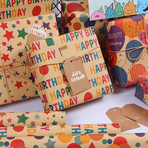 Birthday kraft gift wrapping paper rolls with colorful letters, stars and party patterns