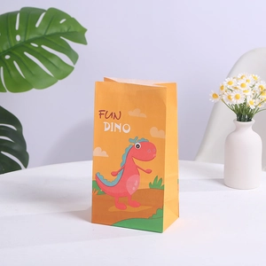 Orange kraft paper gift bag featuring a cartoon dinosaur and Fun Dino text on a table