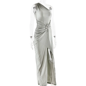 Detailed view of silver-grey one-shoulder maxi dress with side slit and rhinestone buckle