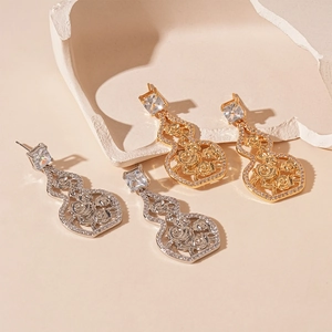 Elegant hollow gourd earrings with zircon floral patterns in gold and silver finish