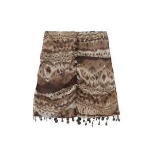 Bohemian brown tie-dye mini skirt with ruched detail and metal coin fringe trim