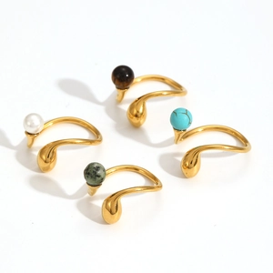 Set of four stainless steel gold open rings with tiger eye and colorful stone beads