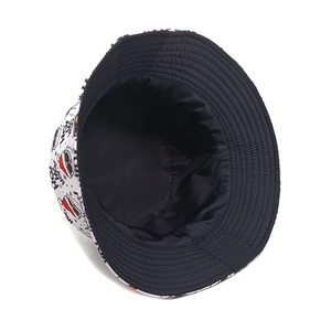 White cotton bucket hat with Santa patterns and HO HO HO print for Christmas sun protection