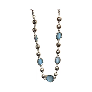 Minimalist silver chain necklace featuring oval blue crystals and polished bead design
