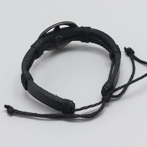 Adjustable men's black leather bracelet featuring a metal pentagram star and braided cords